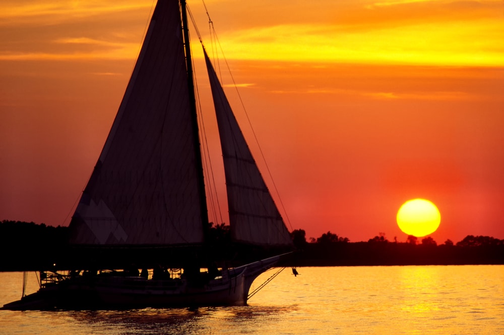Skipjack sailing off the coast of Rock Hall during the best Maryland weekend getaways